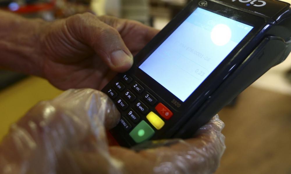Máquina de cartão de crédito (Crédito: Marcelo Camargo/Agência Brasil 